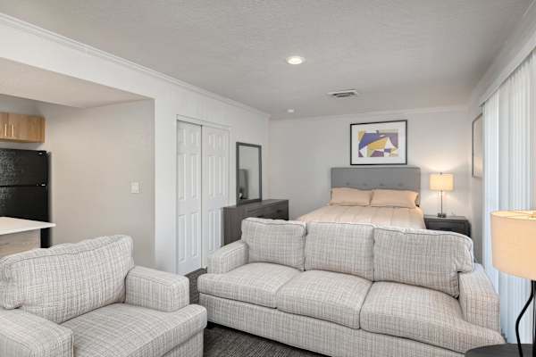 Open Concept Living Room at AVIA Apartments at 110th Street, Kansas